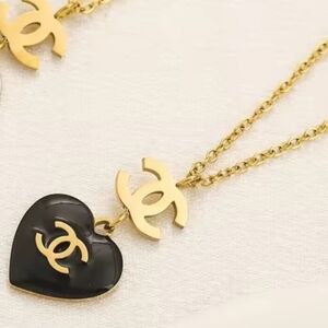 Gold Necklace with Black Heart Pendants